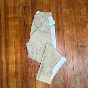 Urban outfitters tan wind pants